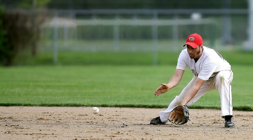 man playing baseball